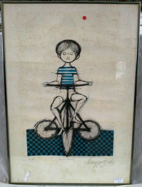 Menino no triciclo
