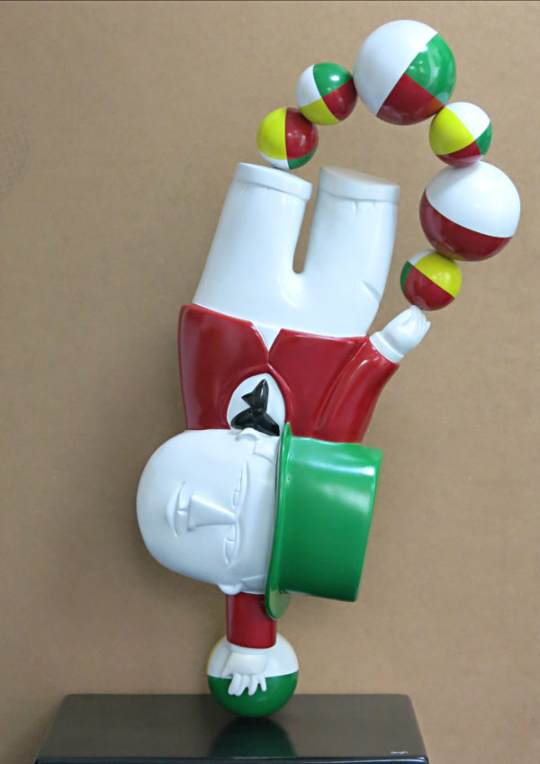 Equilibrista com chapéu
